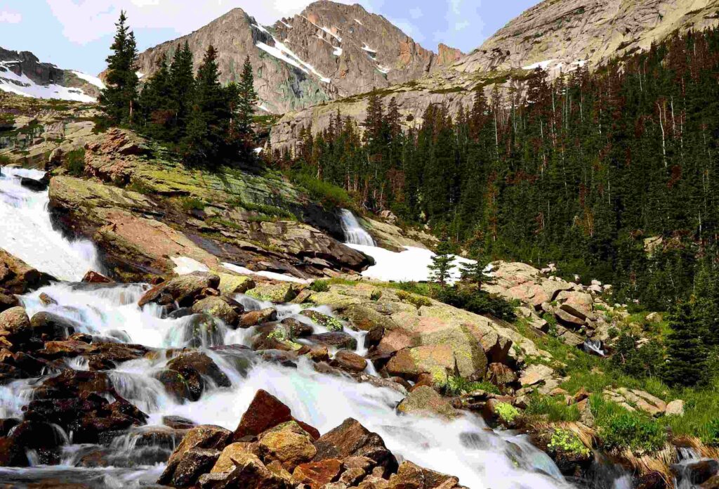 challenging rocky trail and waterfall on the way to Black Lake in Rocky Mountain National Park