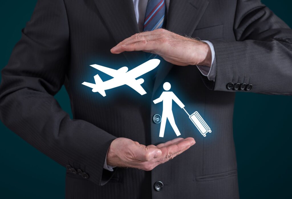 a picture of a man in a black suit holding his hands and there's an icon of an airplane and travel insurance