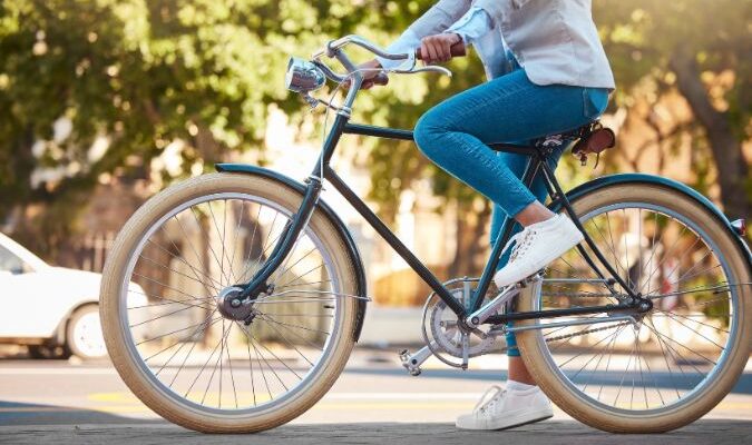 beautiful photo of a girl on a vintage bicycle